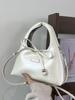 Bolsa de Ombro Elegante e Simples 2026 Nova Bolsa Baguete Vintage Bolsa de Mão Versátil Bolsa de Ombro Meia-Lua