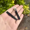 Caja de 28 Piezas Tirador de Mochila Tirador de Cremallera Caja de Plástico Moldeado por Inyección de TPU Tirador de Cremallera de Caja de Cremallera Hebilla de Cremallera Chaqueta Abajo Material de TPU