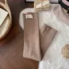 Calcetines finos rayados de otoño e invierno para mujer, calentadores de piernas de punto versátiles estilo japonés con etiqueta de tela
