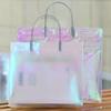 Bolsa de Tote Transparente Láser Bolsa para Tienda de Ropa Bolsa para Tienda Duty Free Bolsa de Regalo en stock para Mujer Laptop tamaño pequeño Apertura Grande Escuela