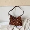 Bolsa de ombro grande para o dia a dia de mulheres, nova bolsa popular de bolinhas para o ombro/axila de 2026, bolsa de mão pequena elegante e única