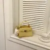 Bolso de Mano de Lujo Ligero Estilo Coreano para Mujer 2026 Primavera Nueva Moda Bolso de Hombro para el Trabajo Bolso Cruzado Elegante de Color Sólido para Mujer