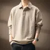 Suéter de punto de manga larga jacquard de alta gama estilo francés con patrón de diamantes para hombre, con un diseño texturizado de corte holgado, cuello alto y forro polar, perfecto para otoño