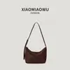Bolsa Hobo Feminina Cor Sólida Leve Coreana Versátil para o Trabalho Verão 2026 Estilo Preguiçoso Casual Simples de Mão/Ombro