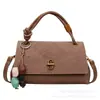 Bolsa transversal pequena quadrada texturizada de alta qualidade para mulheres, estilo coreano, bolsa de ombro moderna e versátil, bolsa de mão elegante para o dia a dia.