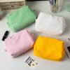 2023 nuevo neceser plisado de onda de color sólido de gran capacidad, bolsa de almacenamiento para estudiantes fresca y amigable con la piel para lavar