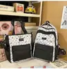Ins estampa nova bolsa de ombro dupla nova grande capacidade grande capacidade mochila para estudante de ensino fundamental campus mochila de viagem para menina