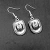 Pendientes de viento de mezclilla estilo retro europeo y americano transfronterizos del viejo oeste, simples, con forma de cabeza de vaca Joker, gancho para la oreja para mujer, venta al por mayor