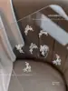 Nuevo Aleación de Arco Joyería para Uñas Líquidas Luz Destellante Diamante de Lujo Luna Mariposa Decoración de Uñas Taladro Al por Mayor