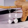 Latón chapado en oro real Venta caliente transfronteriza europea y americana Colgante de perla natural de agua dulce Pendientes de moda versátiles para damas
