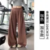 Fornecimento direto da fábrica de calças esportivas cinzas de perna larga para mulheres, com pernas amplas para disfarçar o corpo, adequadas para yoga e uso casual, com suporte para lotes pequenos de marca própria e personalização.