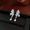Pendientes de Reloj de Bolsillo Asimétricos con Incrustaciones de Perla de Aguja Plateada y Diamante Pendientes de Botón Exquisitos Retro Franceses con Sentido de Diseño Pendientes de Nicho Venta al por Mayor