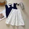 Saia Midi Cáqui Estilo College 2026 Nova Coleção Primavera/Verão Redutora de Idade Estilo Japonês Saia Evasê com Bolsos Coreana