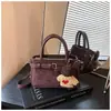 Cor sólida nicho casual simples moda 2026 outono novo estiloso feminino único ombro único transversal pequeno quadrado bolsa