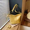Bolso retro simple transfronterizo para mujer 2026 nuevo bolso de hombro cruzado casual versátil para el trabajo y los desplazamientos bolso tipo cubo