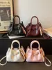 Bolsas Pequeñas de Moda Transfronterizas para Mujer 2026 Nuevo Bolso Cubo Versátil Bolso de Mano Super Popular Bolso Cruzado de Hombro