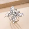 Nuevo anillo de acero inoxidable transfronterizo, moderno y único anillo de mariposa prensado en aceite para mujer, anillo de diseño geométrico que no se decolora