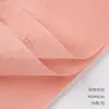 Tela no tejida suave mate para envolver flores, utilizada como material base para cajas de regalo de rosas del Día de San Valentín, disponible en múltiples series de colores para arreglos florales