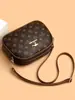 Bolso bandolera mujer 2026 nuevo estilo bolso de hombro moda simple casual estampado bolso pequeño redondo para dama bolso de hombro único estampado