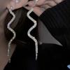Pendientes elegantes con borlas de diamantes de imitación de aguja plateada, estilo europeo y americano, con diamantes de alta calidad para mujer.