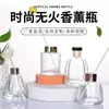 Fábrica en stock Botella de aromaterapia de vidrio creativo incienso de ratán sin fuego expandible para el hogar y el coche botella de incienso transparente adornos de flores secas
