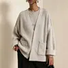 Abrigo tipo cárdigan clásico europeo y americano transfronterizo, nuevo top cárdigan de punto holgado simple con bolsillo para mujer de talla grande de otoño e invierno