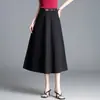 Nueva Falda de Mujer de Color Sólido de Moda para el Trabajo 2026 Otoño Versión Coreana Cintura Alta Adelgazante con Caída Falda Midi de Línea A