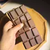 Juguete de Alivio del Estrés de PU Suave de Rebote Ultra Lento Tipo Bloque de Chocolate para Disparar y Exhibición