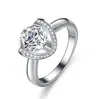 Anel cruzado de boca fechada treme rápido-mão Suprimento ao vivo imitação Moissanite oito-corações oito-flechas Anel de diamante de casamento simples de seis garras para mulheres