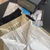 Calça de Linho Texturizada Relaxada! Calças com Corte Levemente Curvo, Modelagem Solta e Comprimento 9/10 para Passeios de Verão e Uso Casual