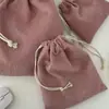 Bolsa de almacenamiento de pana de color liso con cierre de cordón, un juego portátil de tres piezas de gran capacidad y una bolsa de almacenamiento simple