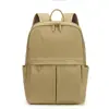 Mochila de viaje, para ir al trabajo y para la escuela de diseño minimalista, tela de nailon, impermeable, versátil, moderna, mochila para mujer de estilo simple