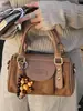 2026 Principios de Otoño Nuevo Elegante Versátil Retro Patchwork Boston Bolso Pequeño Bolso Almohada de Mano Bolso de Hombro Cruzado