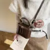 Bolsa de Mão Texturizada Simples Estilo Coreano 2026 Inverno Nova Moda Tendência Versátil de Ombro Transversal