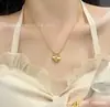 Tienda de Oro Más Vendida Mismo Estilo Trébol Flor Individual Collar Cadena Clavícula Láser Moda Simple Popular Transmisión en Vivo Venta al por Mayor Fábrica