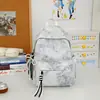 Mochila escolar para estudantes do ensino fundamental II e médio, mochila tie-dye de estrelas, versão coreana, nicho, alto valor estético, grande capacidade, mochila leve