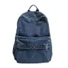 Mochila jeans vintage lavada com design de rebites, bolsa de ombro versátil para estudantes universitários, adequada para a aula e o trajeto