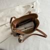 Bolso grande para mujer, bolso de gran capacidad, nuevo 2024, bolso de hombro de nicho de alta calidad, bolso de mano para estudiantes universitarios de clase alta.