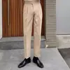 Pantalones de vestir de tiro alto estilo italiano Nápoles París con botones Primavera Nuevos Adelgazantes Altos Versátiles Cortos Casuales Hombres Tendencia