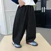 Calças de menino para o outono de 2026, novas calças de moletom xadrez estilosas para crianças, calças compridas casuais estilo jogger de perna larga para meninos, modernas e descoladas
