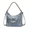 Bolso de mano pequeño cuadrado de moda estilo coreano transfronterizo para mujer, nuevo modelo de verano 2026, bolso de hombro simple con bloques de color, mochila versátil