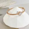 Pulseira da moda de luxo preto e branco trevo de quatro folhas da fábrica direto pulseira simples de ouro rosa pulseira aberta versátil
