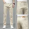 Jeans rectos de alta gama y modernos para hombre, nuevos pantalones casuales de mezclilla gris claro para otoño, nuevos pantalones casuales elásticos para hombre 2026