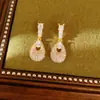 Brincos de tarracha em formato de gota d'água com zircônia cúbica banhados a ouro 18k vintage, brincos de temperamento requintado e moderno, joias de ouvido com sensação de luxo leve e de alta qualidade