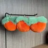 Colgante Llavero de Piel Sintética de Conejo Rex con Diseño de Caqui para Coches, Regalos de Cumpleaños y Accesorios de Bolsos