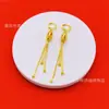 Pendientes Dulces de Borla de Tres Líneas Chapados en Cobre Dorado Estilo Nuevo para Mujer, Aros Vintage con Cuentas de la Fortuna, Venta al por Mayor
