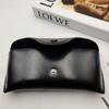 Nuevo estuche de cuero negro para gafas bolsa para gafas que contiene gafas de sol aterciopeladas caja de almacenamiento para gafas bolsa suave personalización