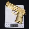 Juguete de pollo para comer Águila del Desierto Oro banda elástica aleación arena Águila pistola puede ser continua banda elástica Modelo 13cm