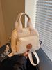 Bolsos de Mano Casuales de Nicho Transfronterizo para Mujer 2025 Nuevo Bolso Bandolera Versátil y Ligero para Ir al Trabajo Fuera de la Oficina