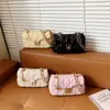 Bolso bandolera transfronterizo, bolso de cadena, popular bolso cuadrado pequeño estilo Chanel, bolso de hombro, bolso acolchado elegante de lujo ligero para debajo del brazo para mujer